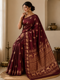 Plum Banarasi Handloom Mashru Silk Saree featuring authentic Kaduwa weaving, intricate gold zari deer and animal motifs, a rich traditional Banarasi pallu, Silk Mark Certified pure silk, dyeable to your choice of colors, and a matching running blouse piece, perfect for weddings and festive occasions.
