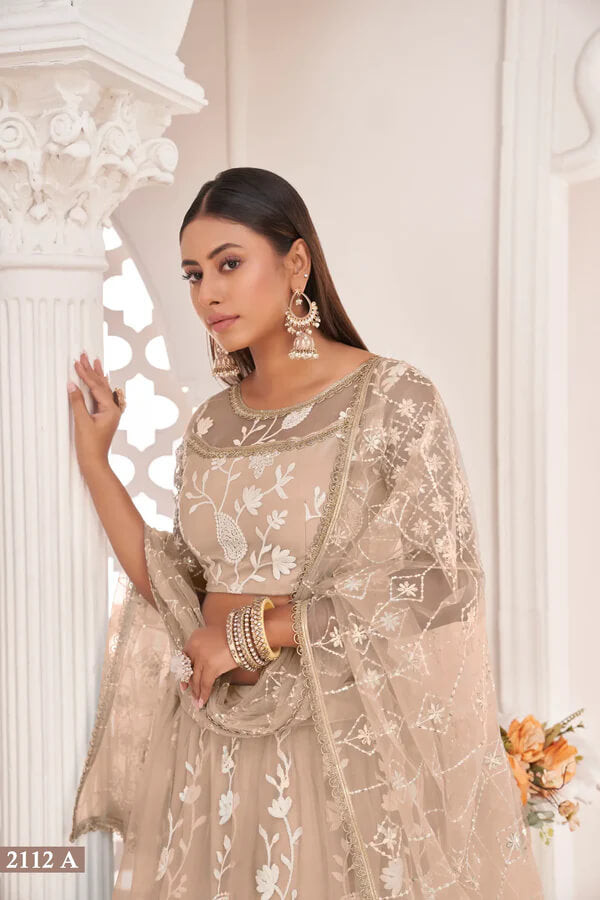 Elegant Beige Net Embroidered Lehenga Choli