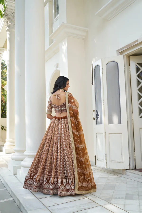 Stylish Dusty Rose Net Lehenga Choli with Thread Work
