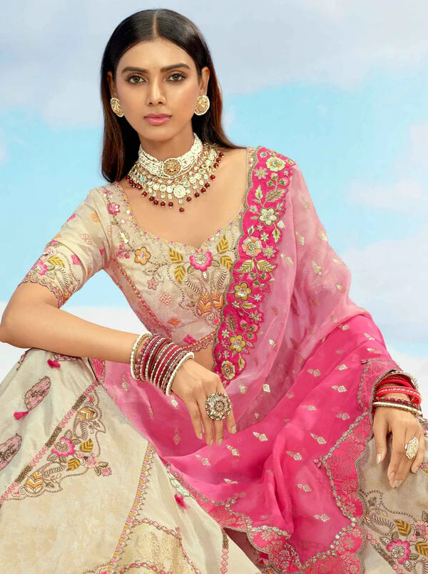Pastel Beige Pink Bridal Lehenga with Fine Detailing