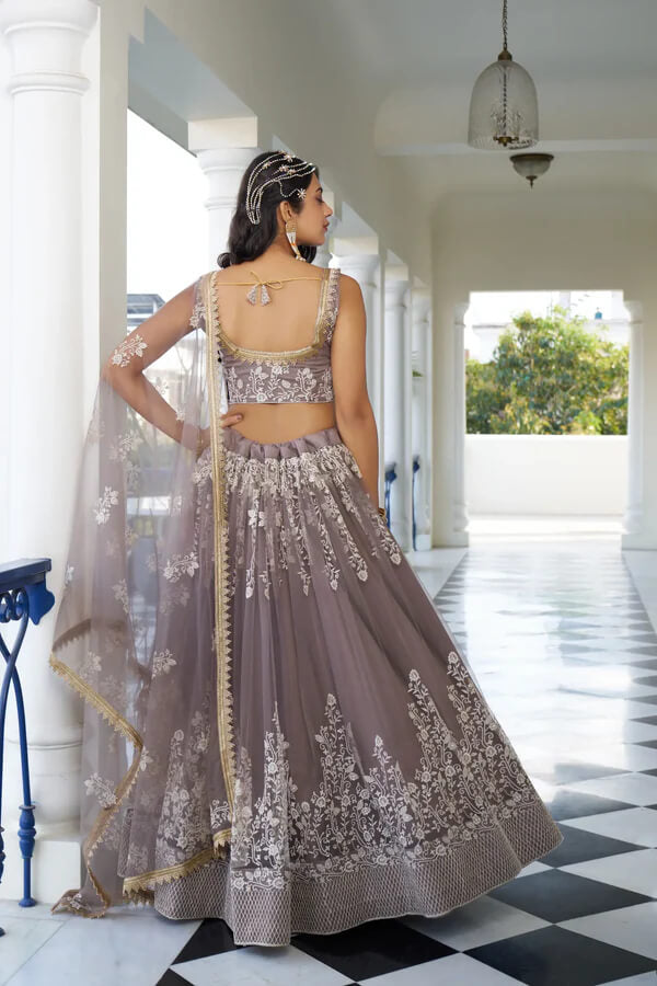 Designer Dusty Rose Net Lehenga Choli with Sequins Detailing