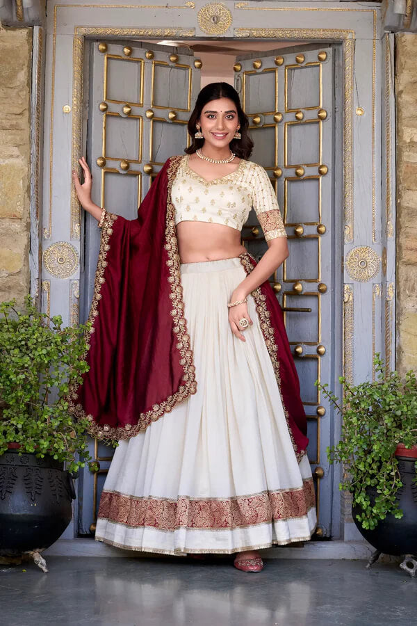 Off White Silk Lehenga with Zari Weaving and Sequins Accent