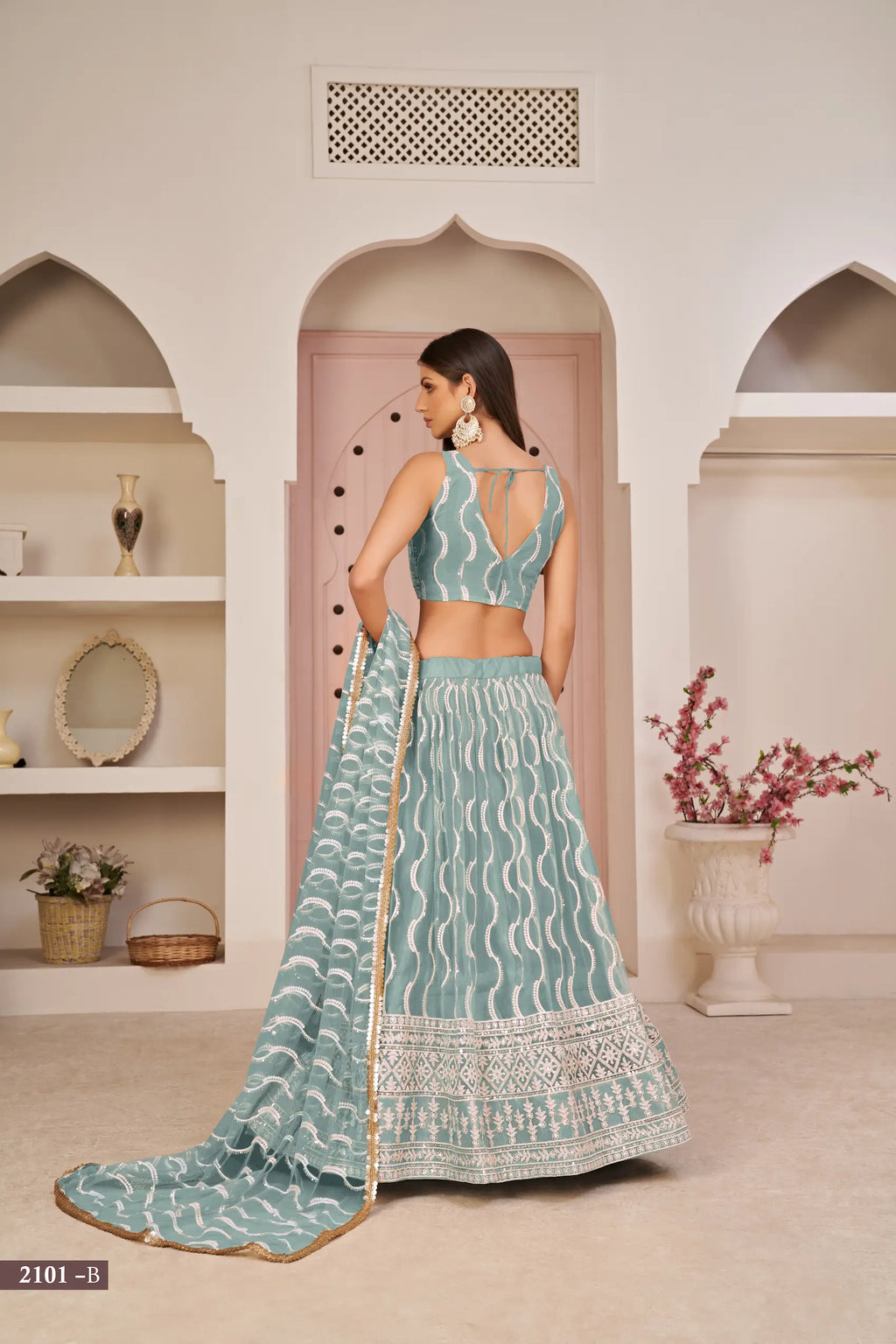 Ocean Blue Thread Sequins Embroidery Net Lehenga Choli