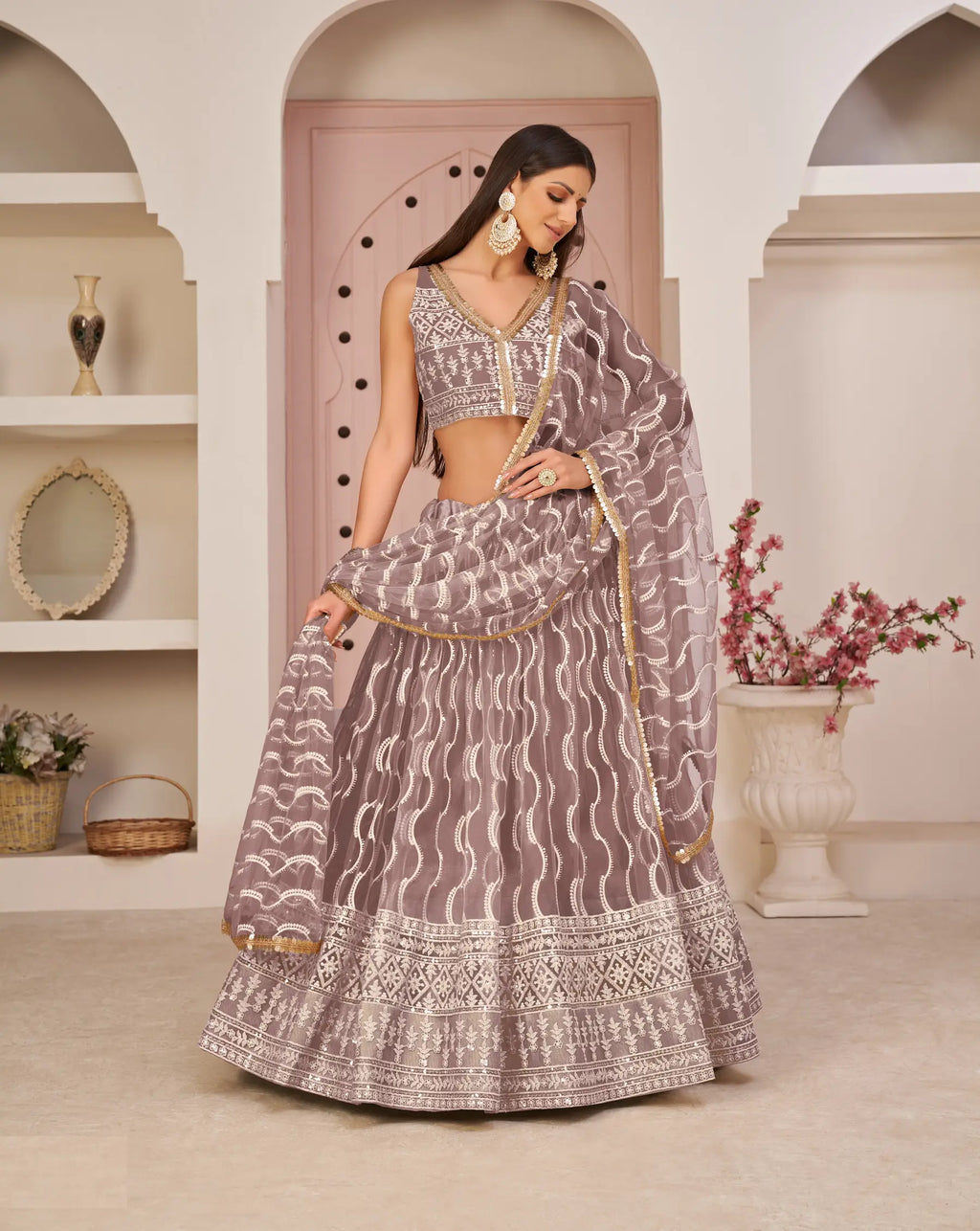 Onion Pink Thread Sequins Embroidery Net Lehenga Choli