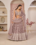 Onion Pink Thread Sequins Embroidery Net Lehenga Choli