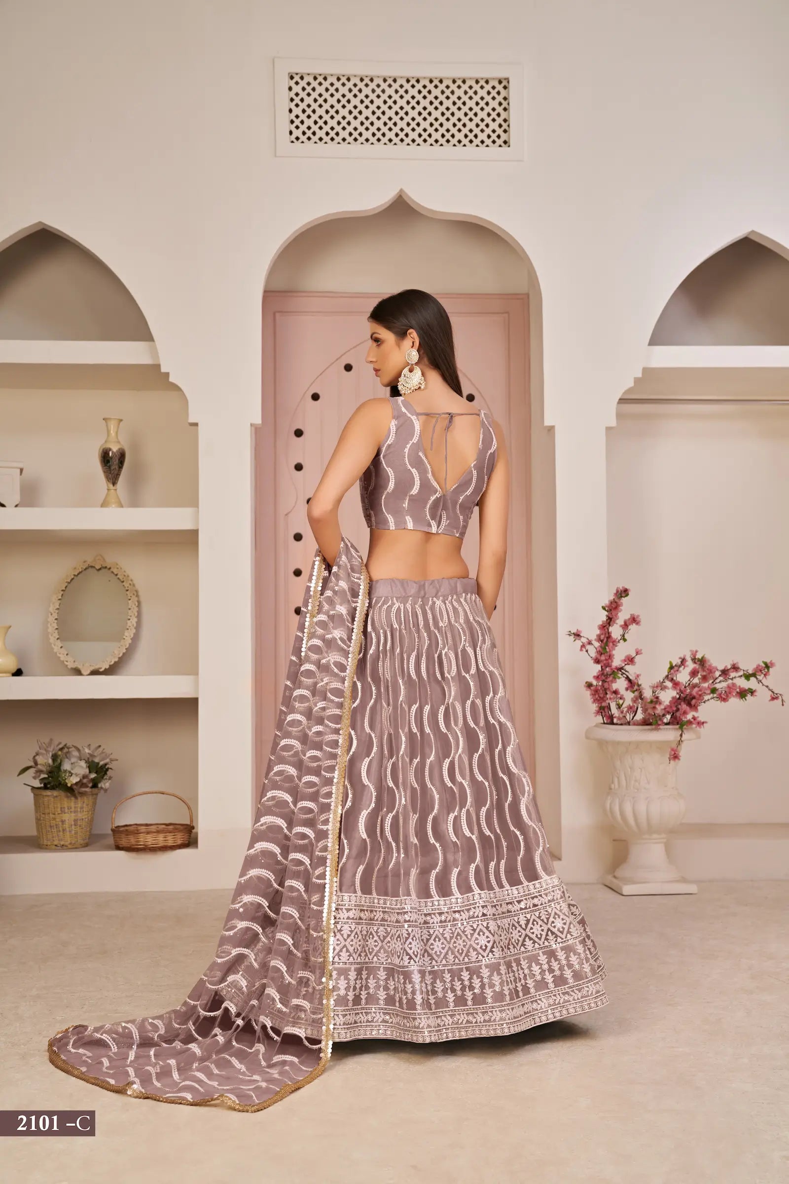 Onion Pink Thread Sequins Embroidery Net Lehenga Choli