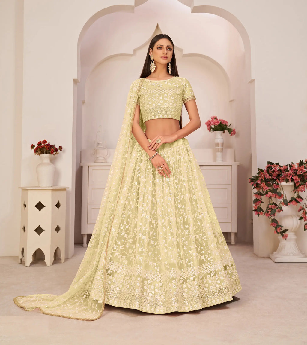 Lemon Yellow Thread Sequins Embroidery Net Lehenga Choli