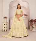 Lemon Yellow Thread Sequins Embroidery Net Lehenga Choli