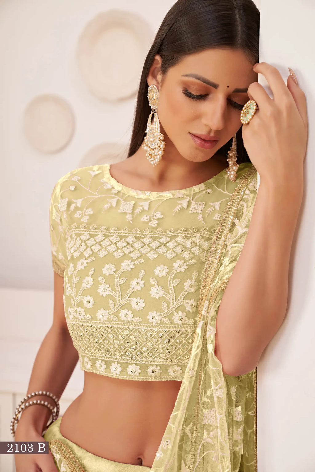 Lemon Yellow Thread Sequins Embroidery Net Lehenga Choli