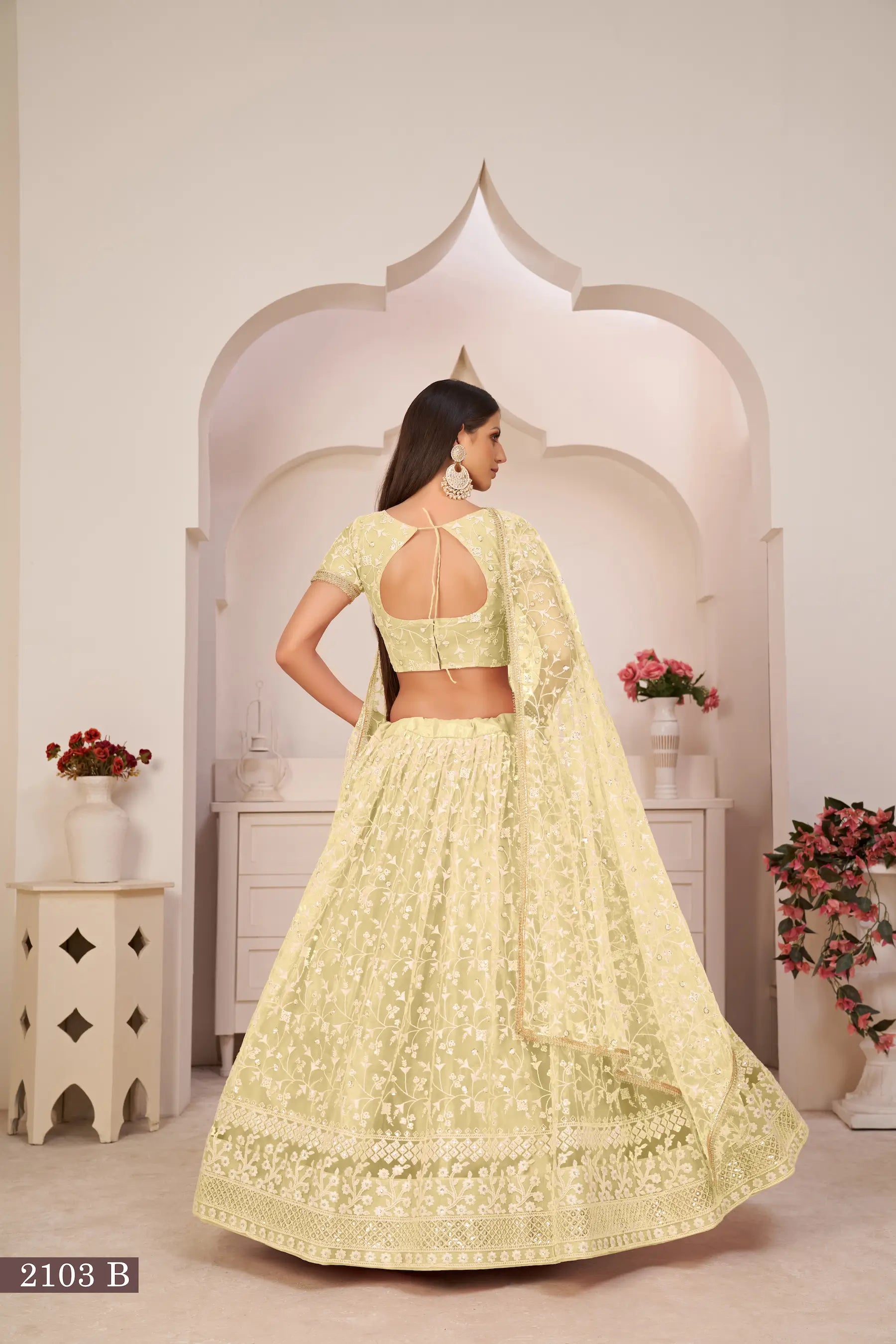 Lemon Yellow Thread Sequins Embroidery Net Lehenga Choli