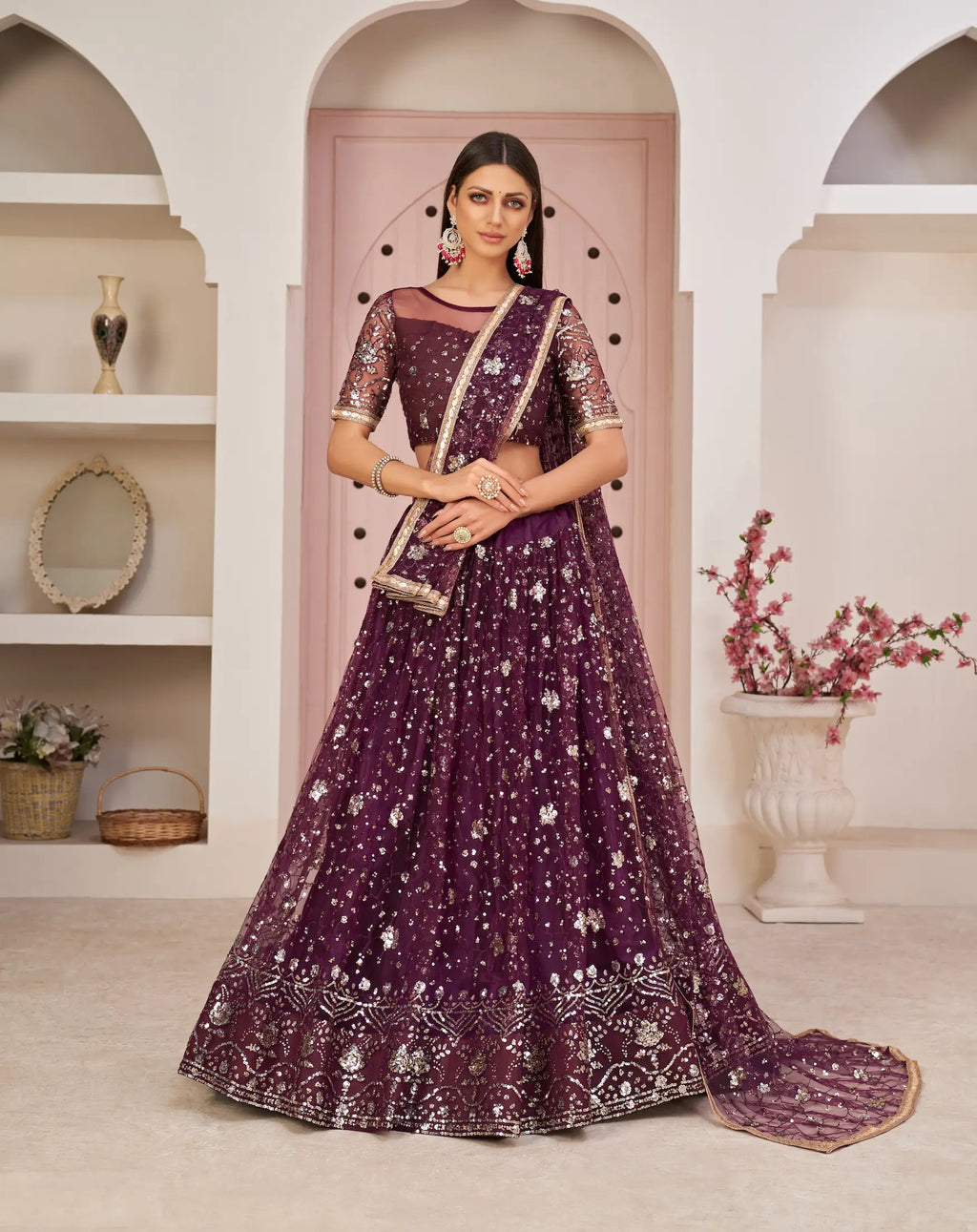 Wine Net Lehenga With Zari Sequins Thread Embroidery