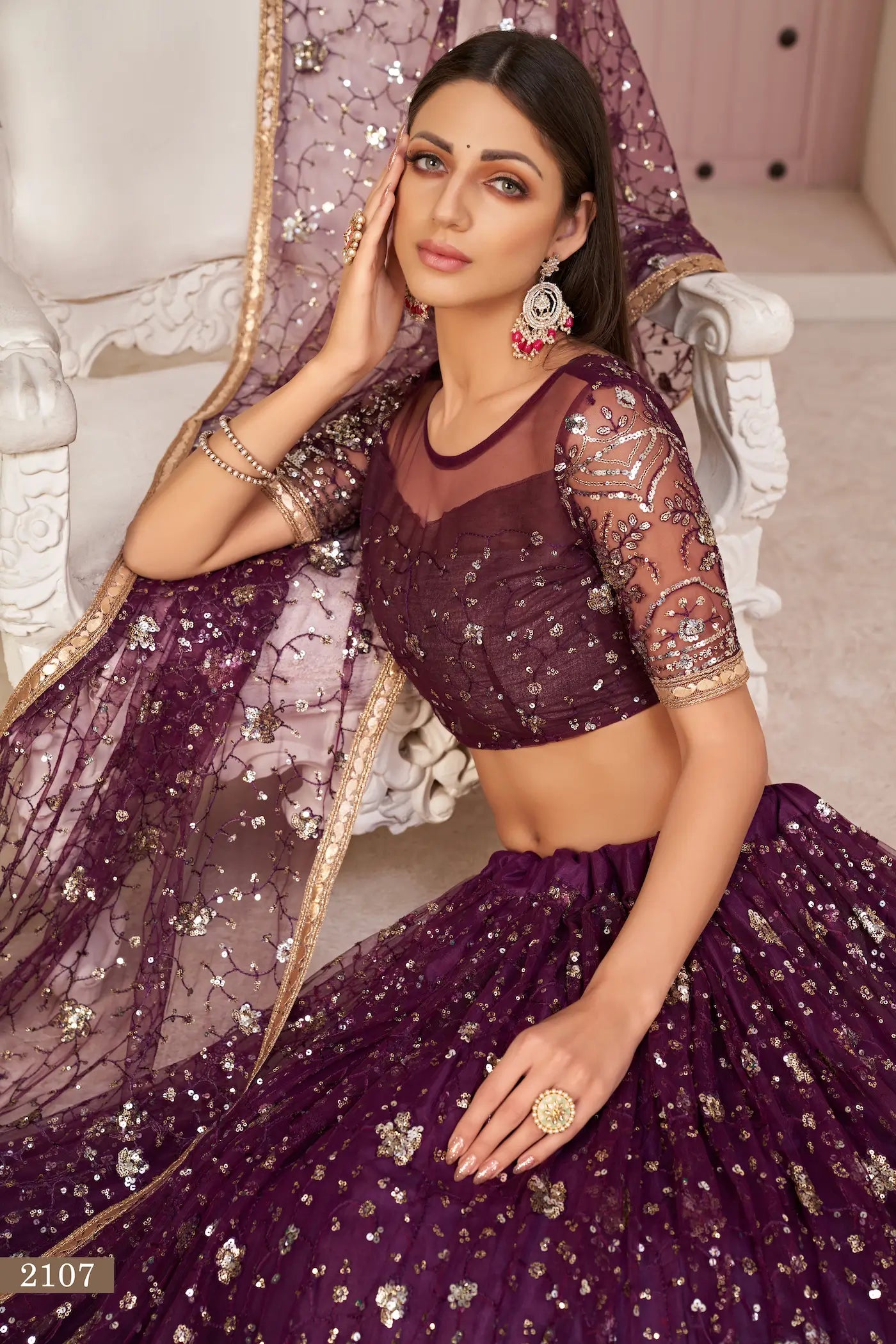 Wine Net Lehenga With Zari Sequins Thread Embroidery