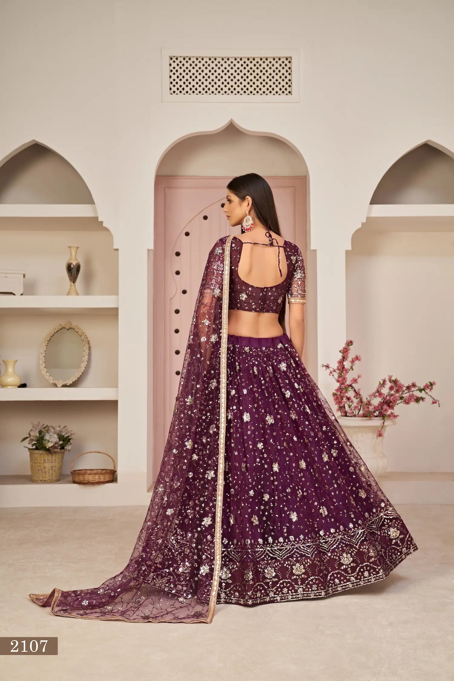 Wine Net Lehenga With Zari Sequins Thread Embroidery