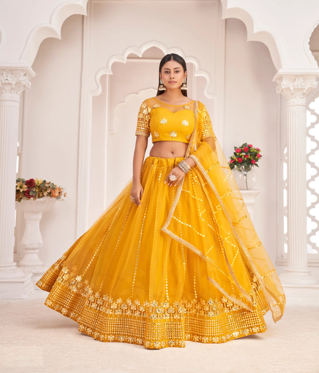 Yellow Thread & Paper Mirror Embroidery Net Lehenga Choli
