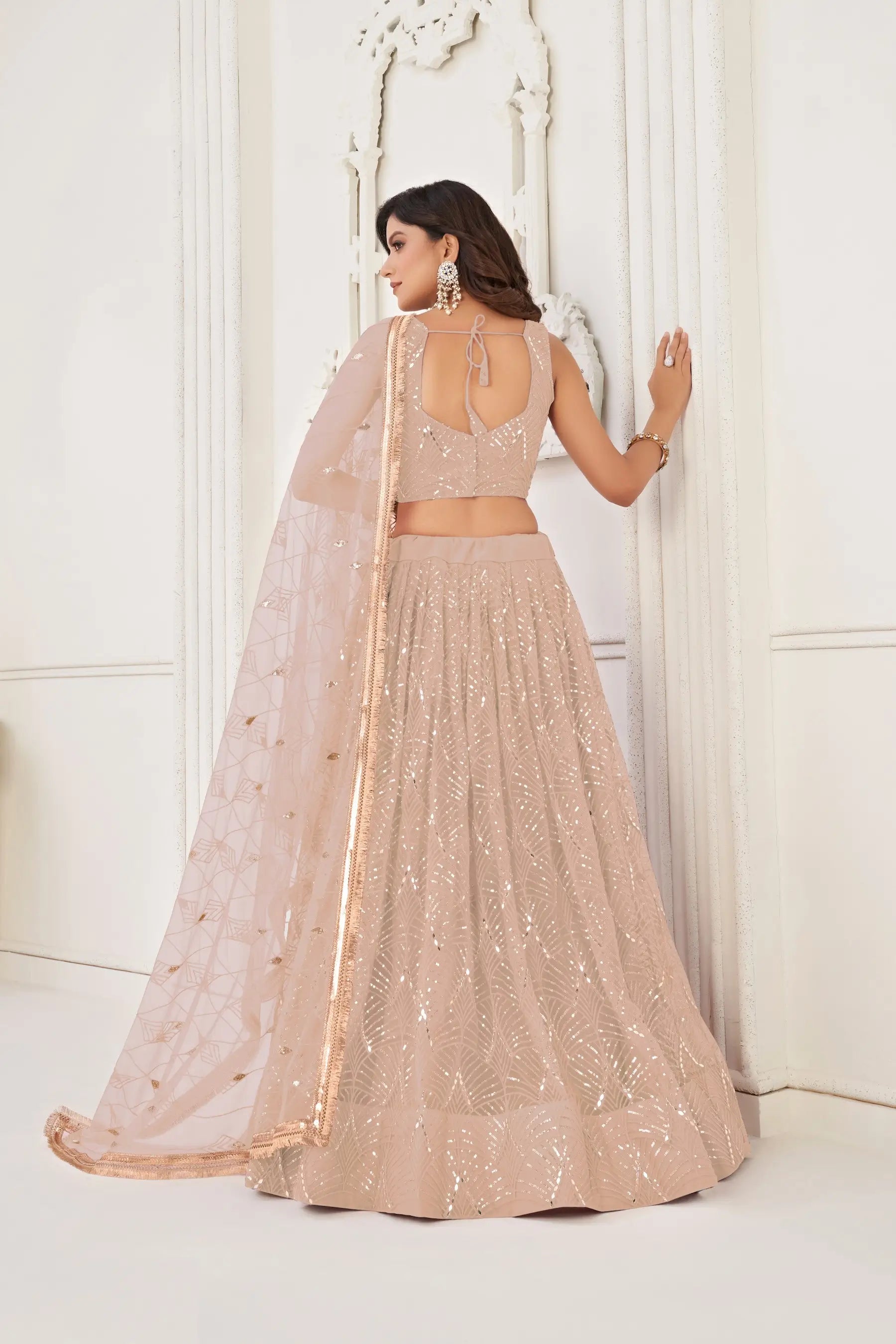 Soft Peach Sequins Embroidery Net Lehenga