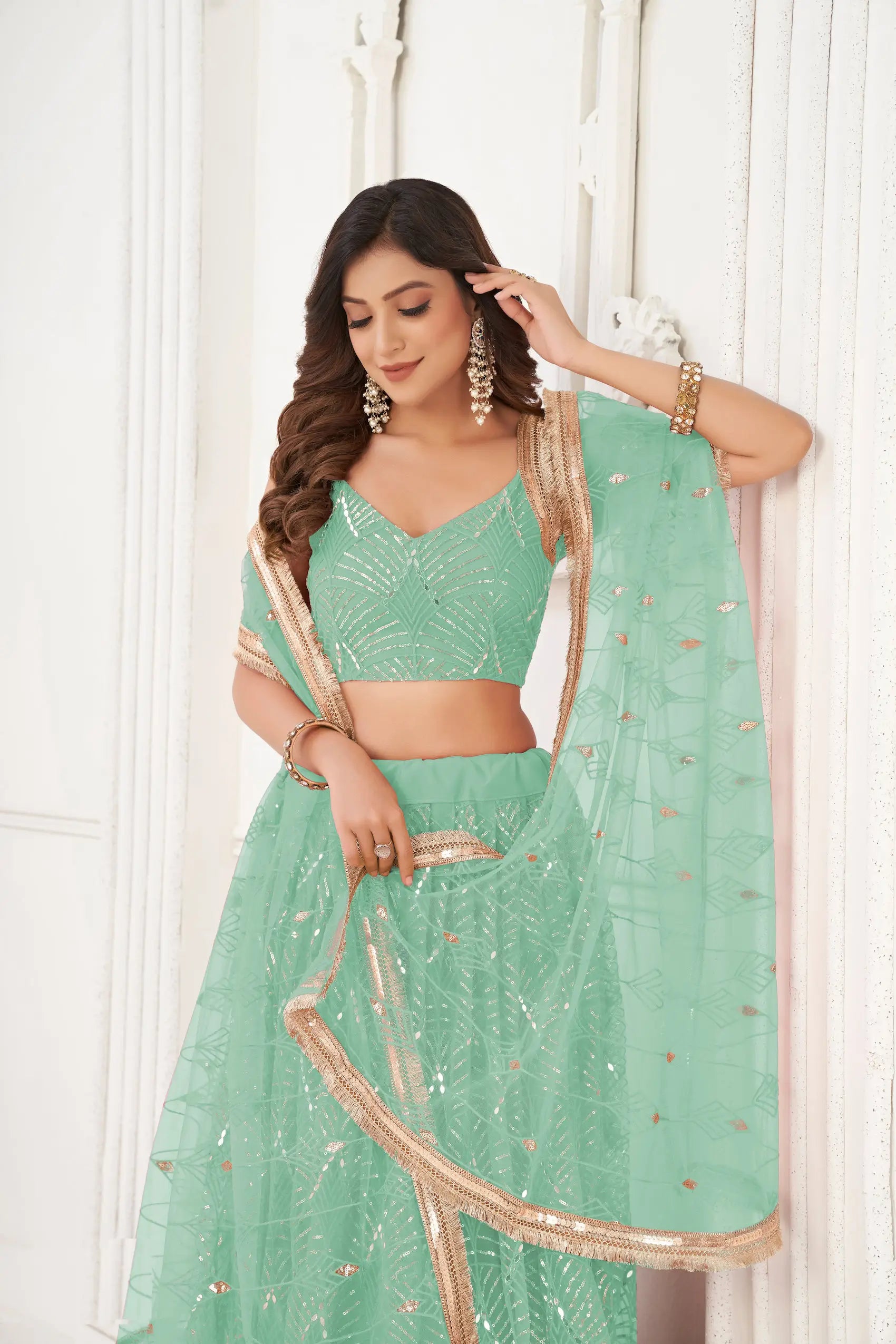 Sea Green Sequins Embroidery Net Lehenga Choli