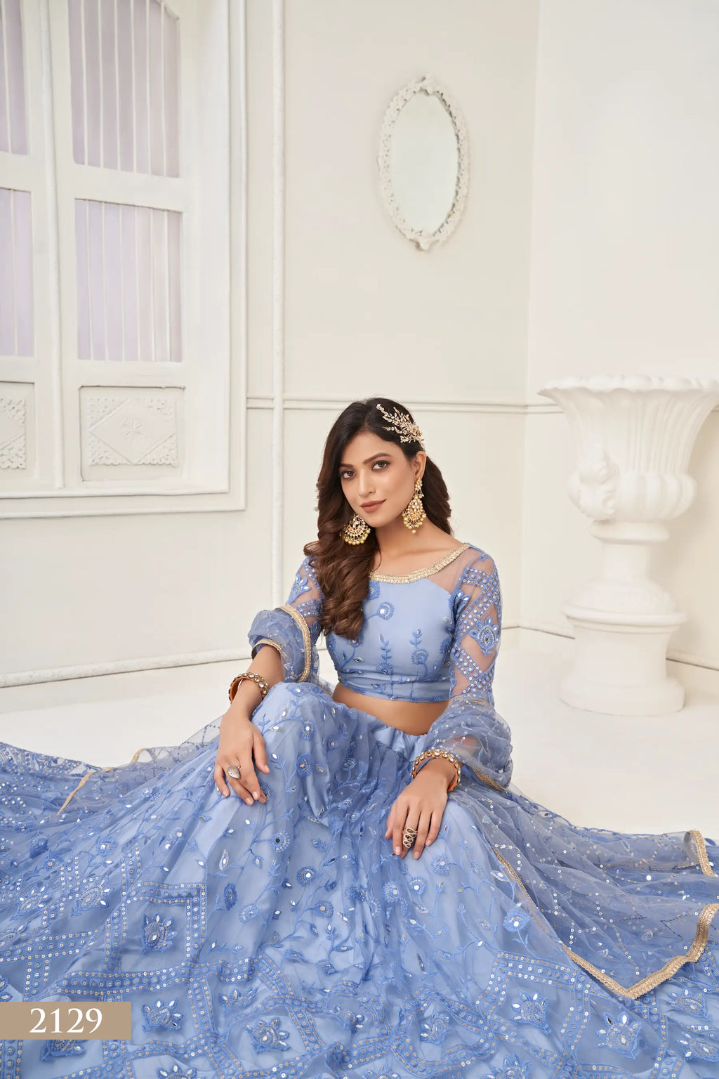 Grayish Blue Thread Sequins Embroidery Net Lehenga Choli