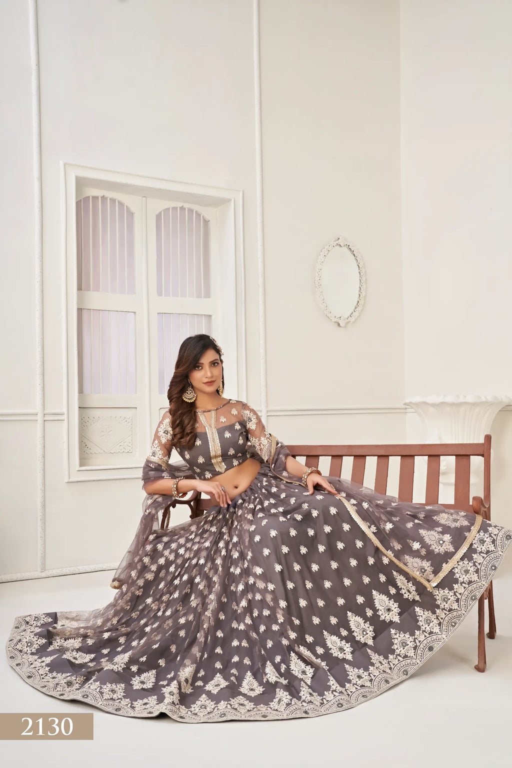 Grayish Brown Thread Sequins Embroidery Net Lehenga Choli