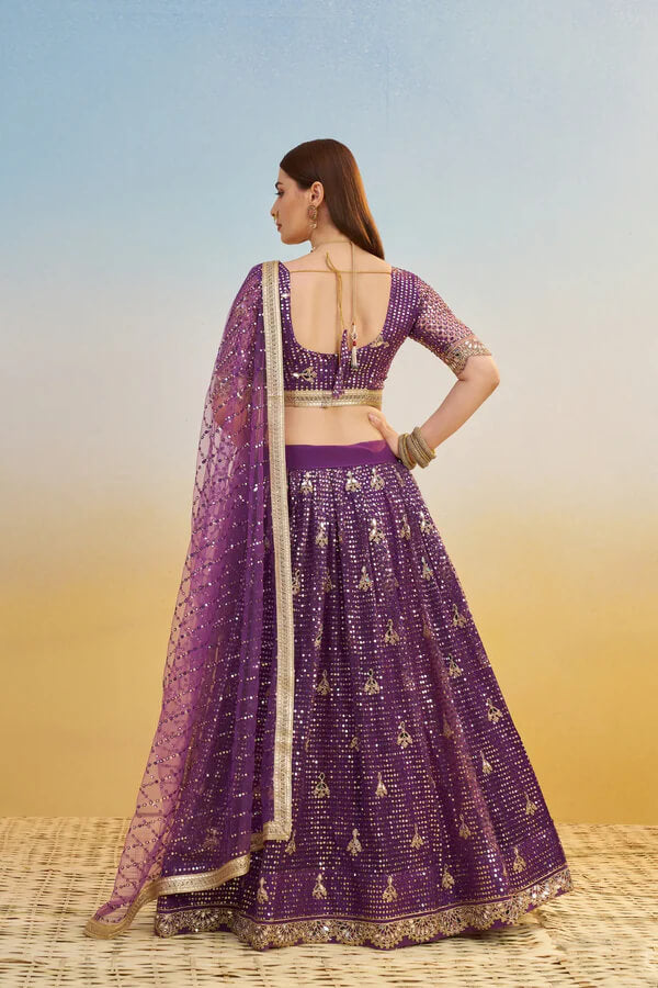 Glamorous Dark Purple Net Lehenga Choli for Weddings