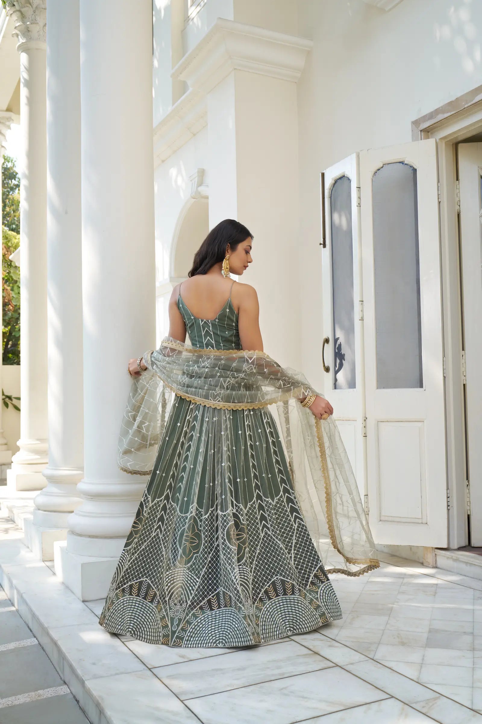 Dull Green Thread Sequins Embroidery Net Lehenga Choli