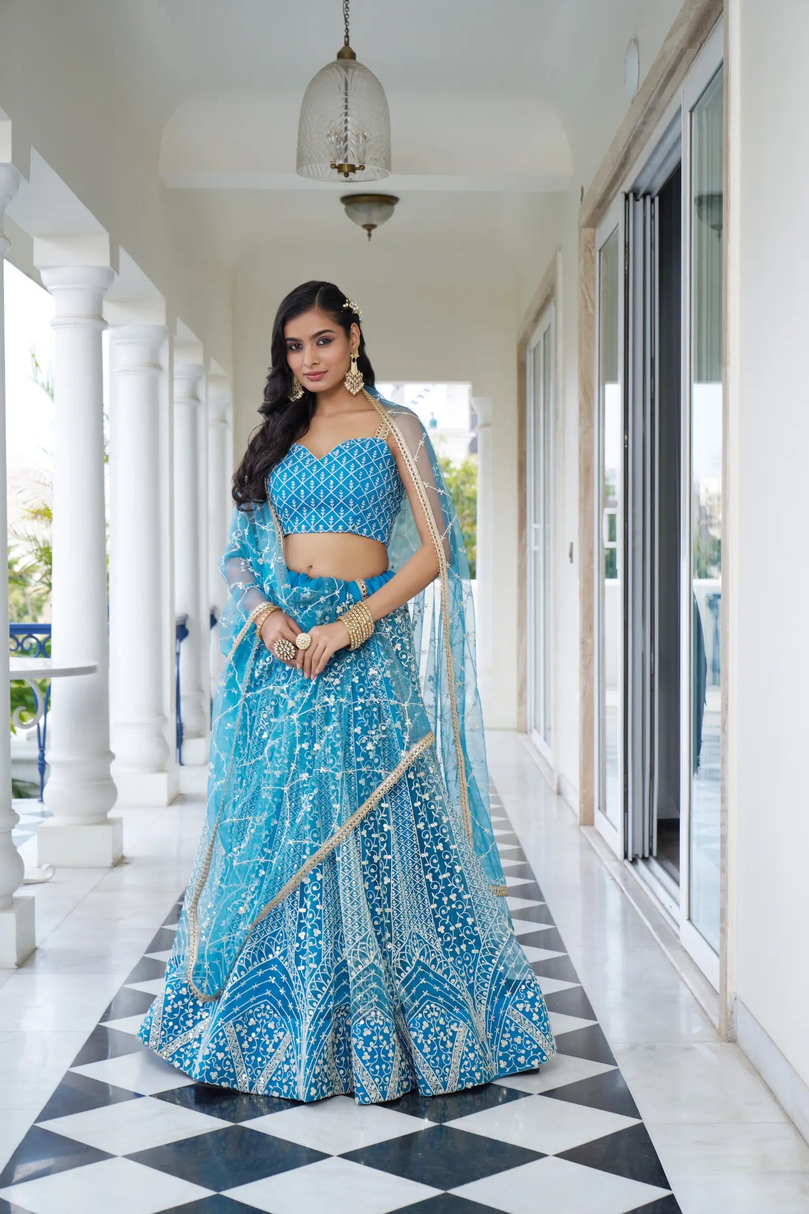 Pacific Blue Thread Sequins Embroidery Net Lehenga Choli