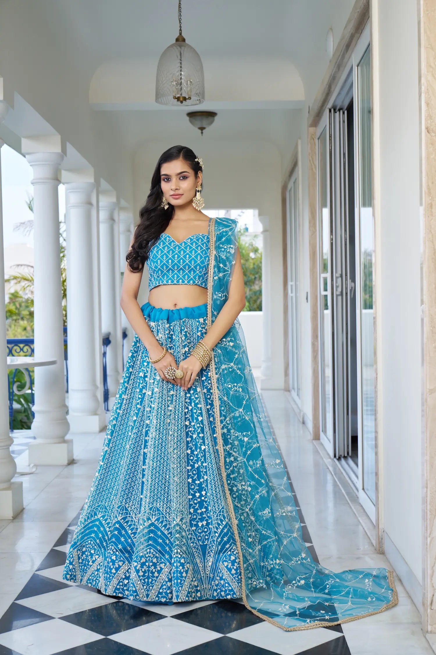 Pacific Blue Thread Sequins Embroidery Net Lehenga Choli