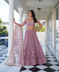 Dusty Pink Thread Sequins Embroidery Net Lehenga Choli