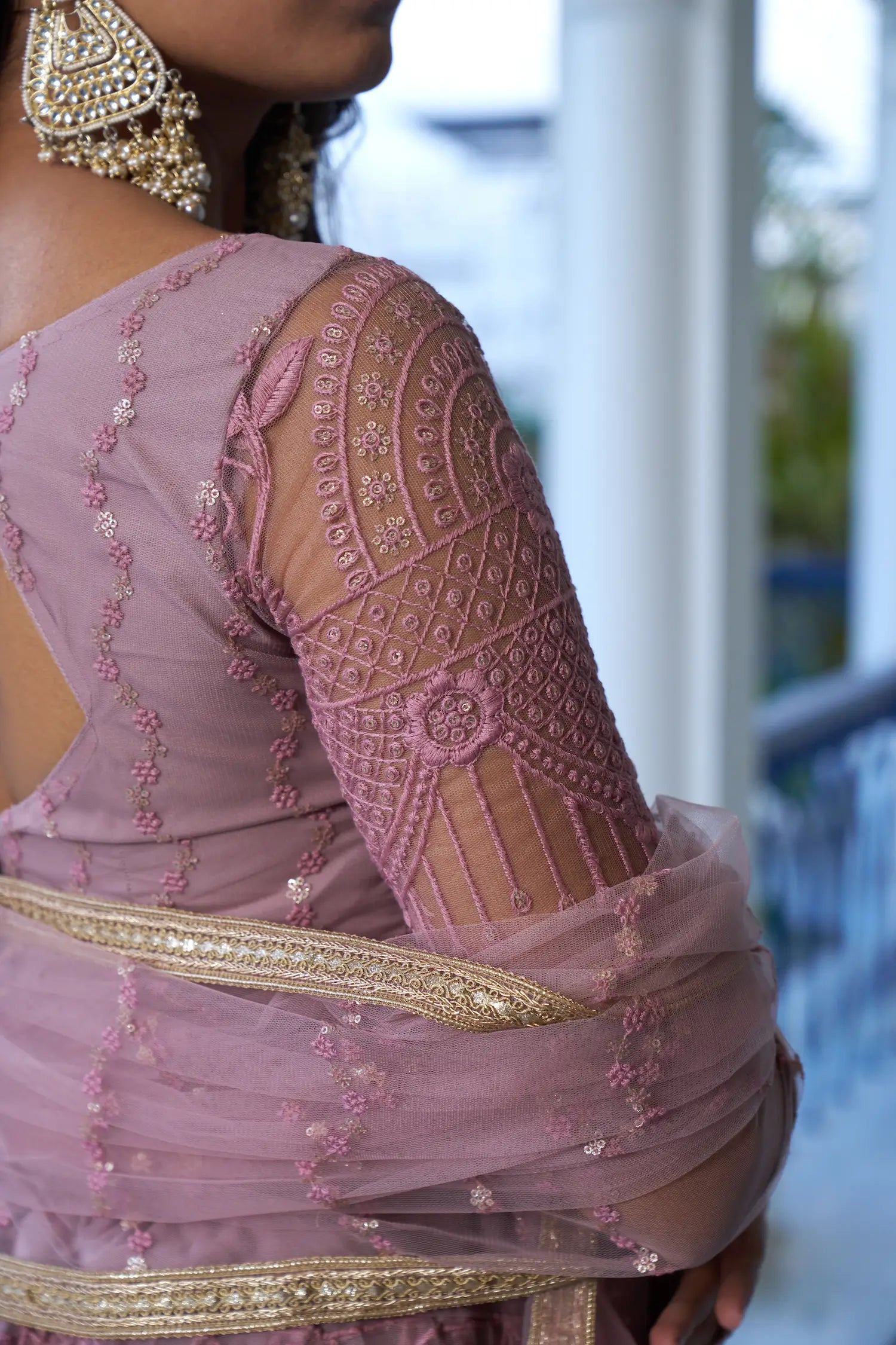 Dusty Pink Thread Sequins Embroidery Net Lehenga Choli
