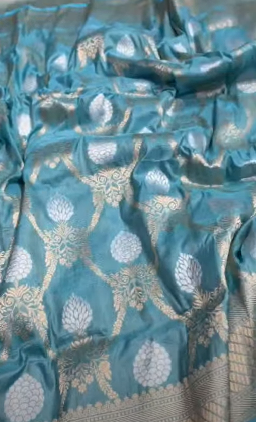Dual Tone Turquoise and Green Banarasi Katan Silk Saree with Gold and Silver Sona Rupa Zari Weaving and Silk Mark Tag.