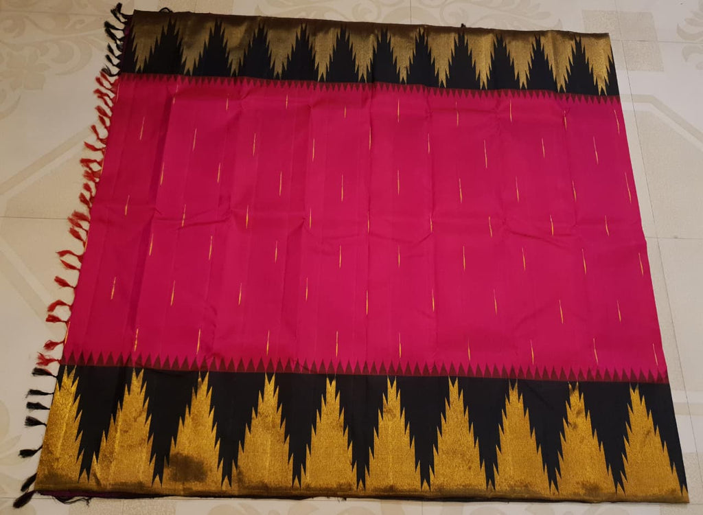 Dark Pink Kanchipuram handloom korvai temple silk saree featuring black and gold zari temple borders, a rich gold zari pallu, and a certified silk mark weave.