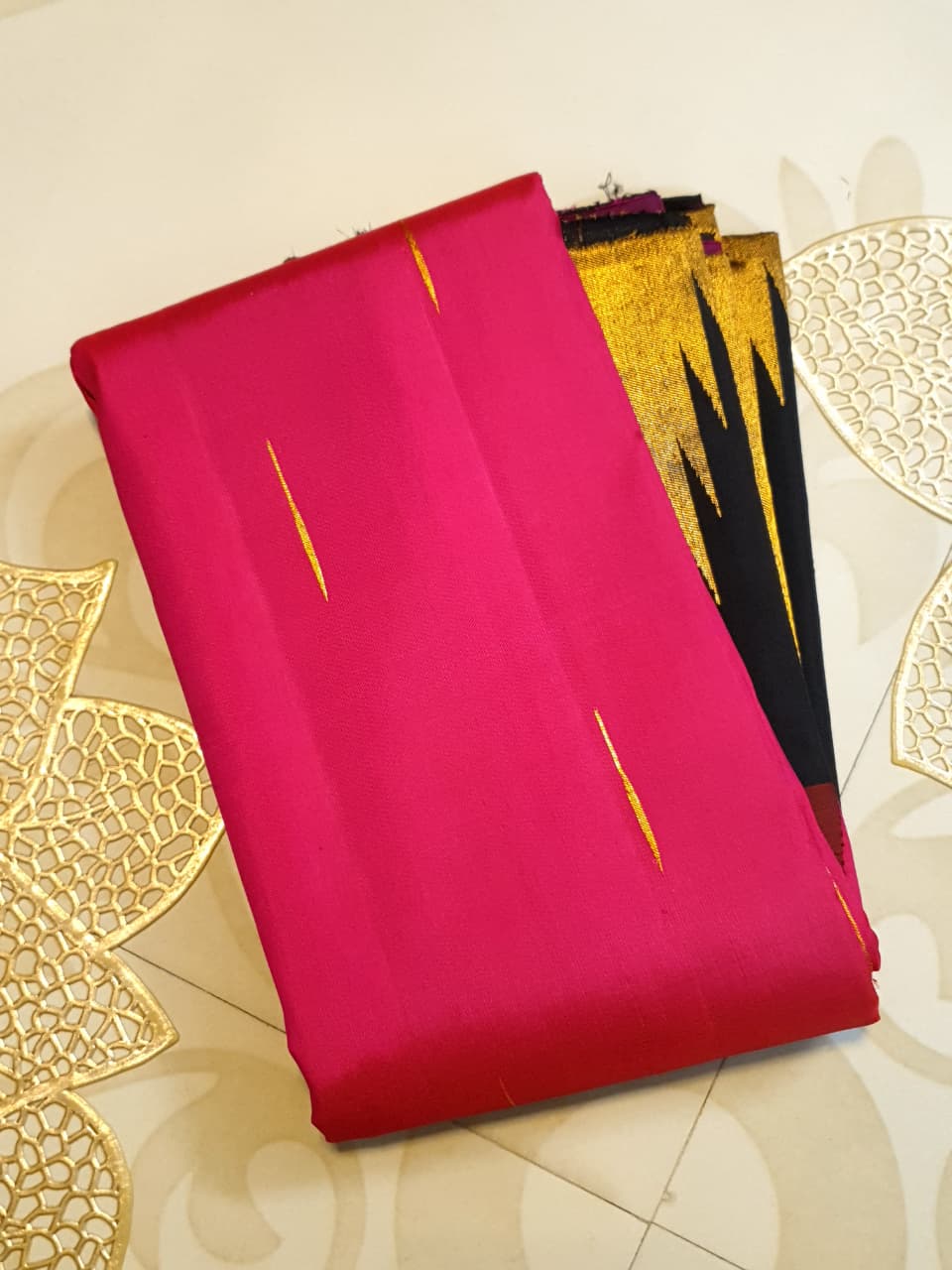 Dark Pink Kanchipuram handloom korvai temple silk saree featuring black and gold zari temple borders, a rich gold zari pallu, and a certified silk mark weave.