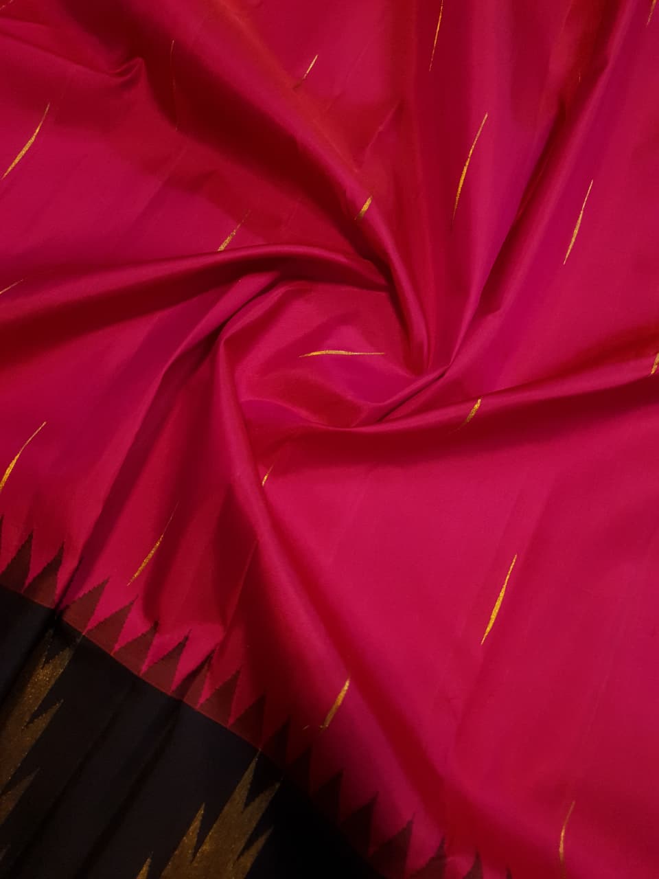 Dark Pink Kanchipuram handloom korvai temple silk saree featuring black and gold zari temple borders, a rich gold zari pallu, and a certified silk mark weave.