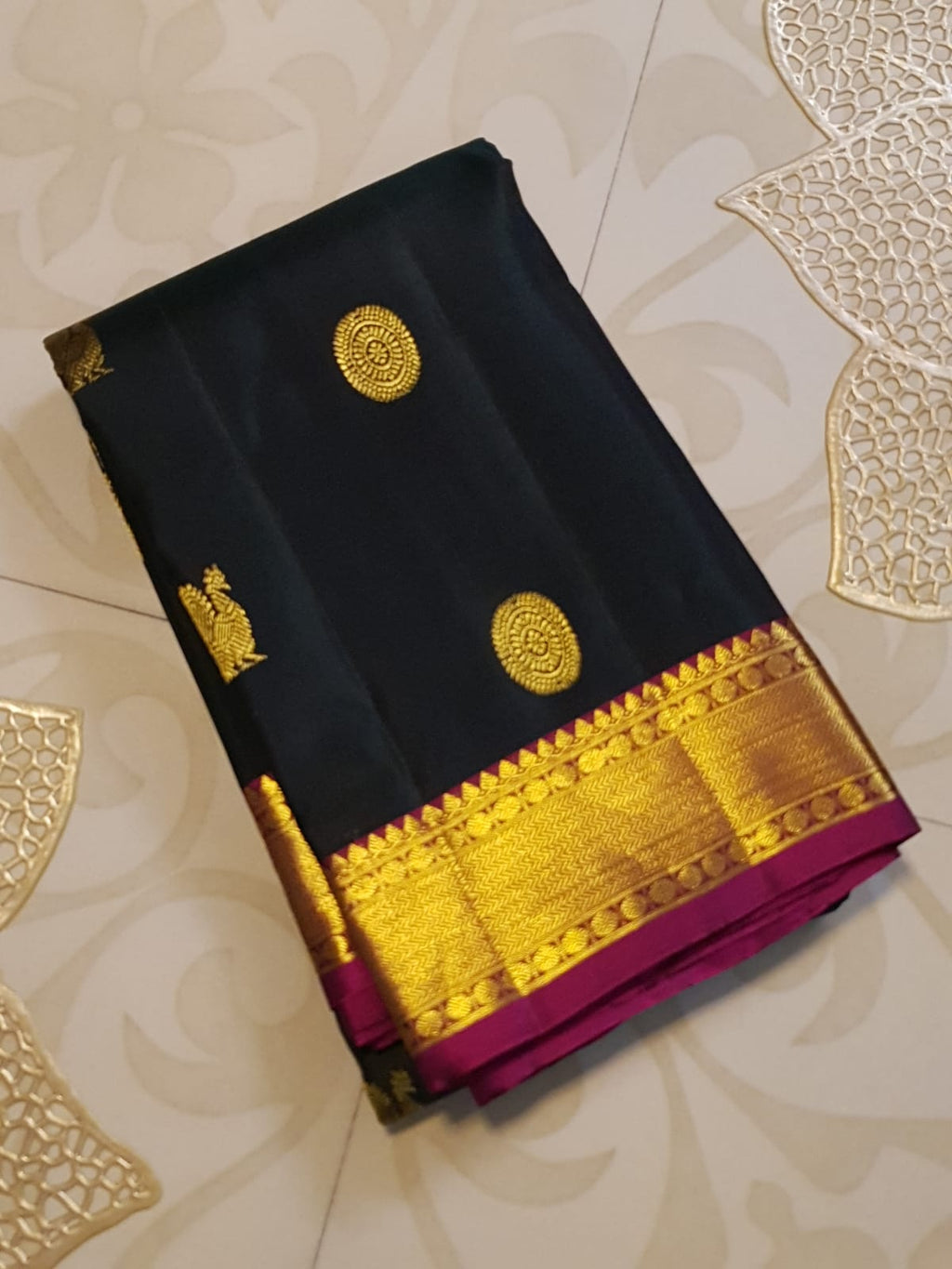 Black Kanchipuram Handloom 2G Gold Pattu Silk Saree with Malayil Charam and traditional Kanchi motifs.