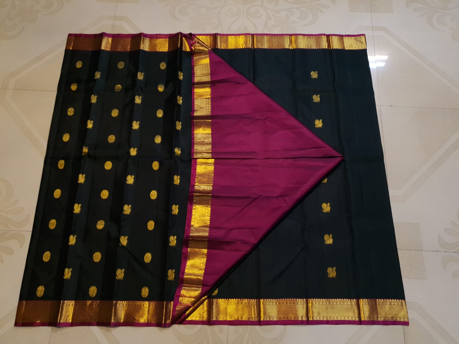 Black Kanchipuram Handloom 2G Gold Pattu Silk Saree with Malayil Charam and traditional Kanchi motifs.