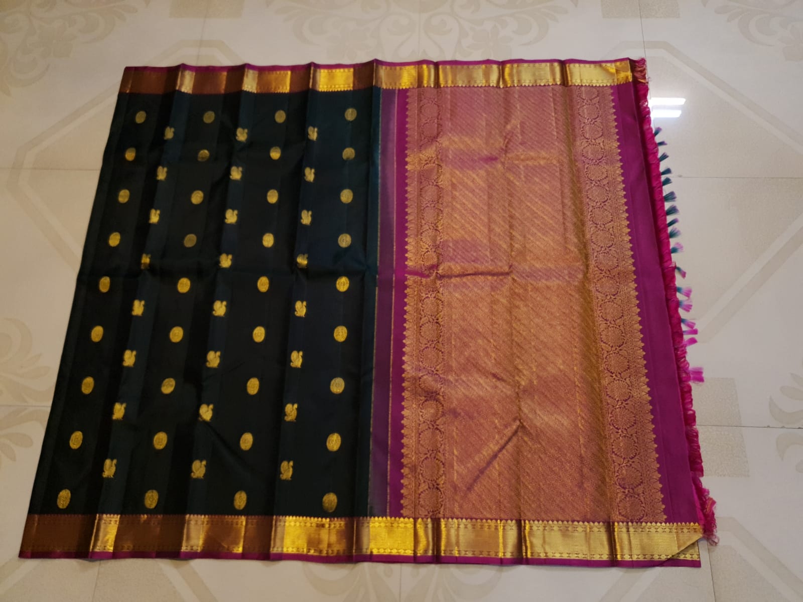 Black Kanchipuram Handloom 2G Gold Pattu Silk Saree with Malayil Charam and traditional Kanchi motifs.