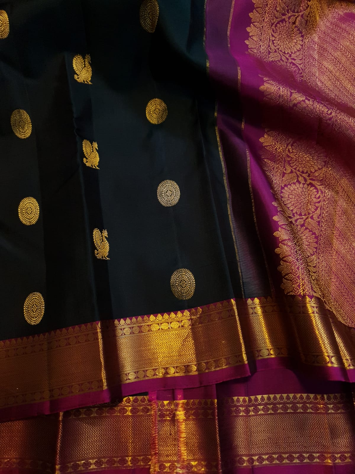 Black Kanchipuram Handloom 2G Gold Pattu Silk Saree with Malayil Charam and traditional Kanchi motifs.