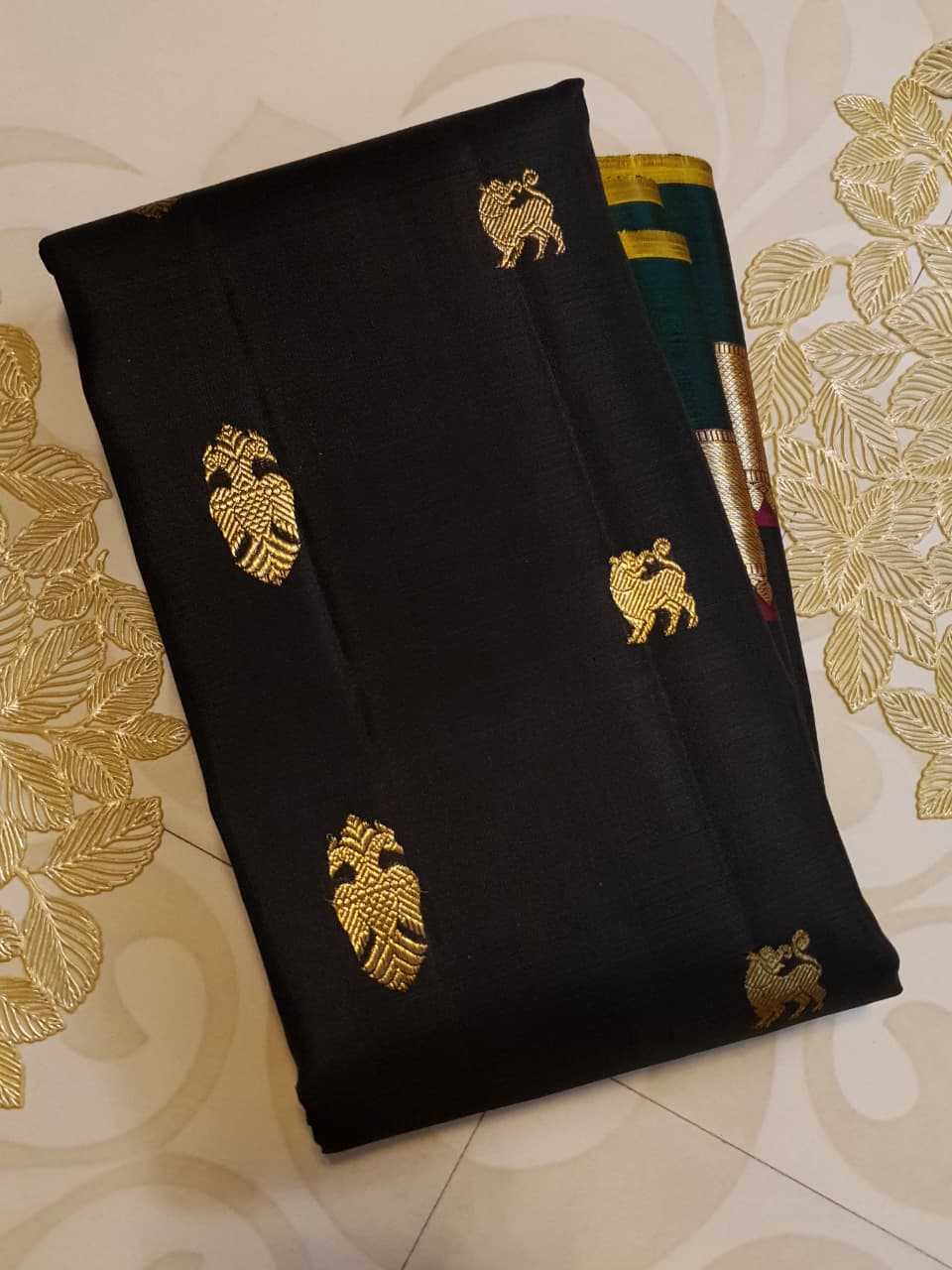Darkest Purple Kanchipuram Handloom 2G Gold Pattu Silk Saree with Bottle Green and Red borders.