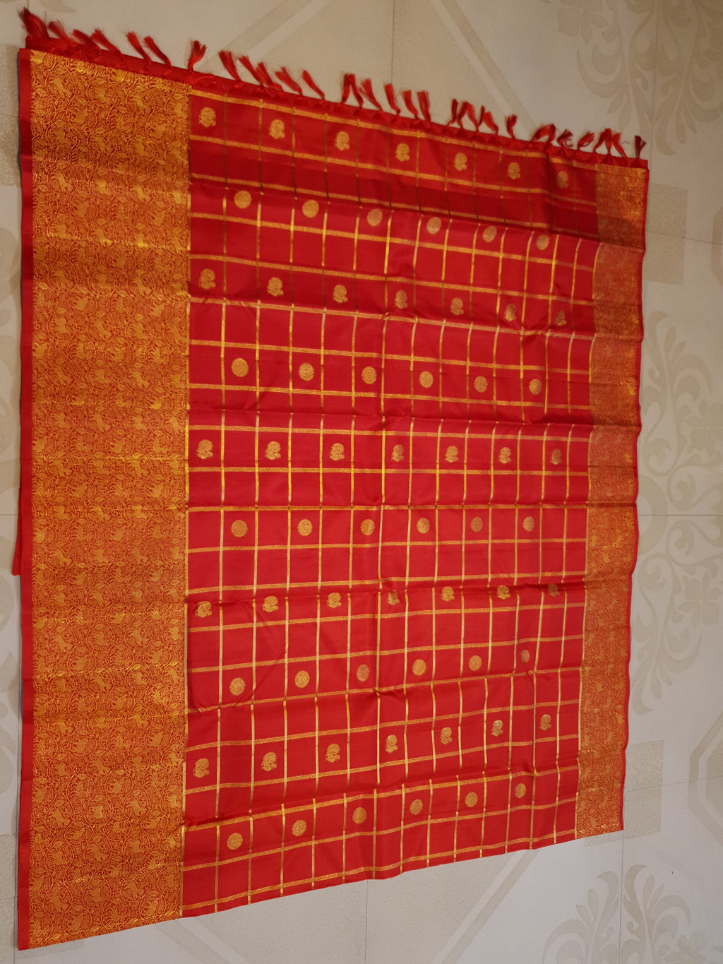 Chilly Red Kanchipuram Handloom 2G Gold Pattu Silk Saree with golden grid patterns, ornate animal-motif borders, and an opulent gold zari pallu.