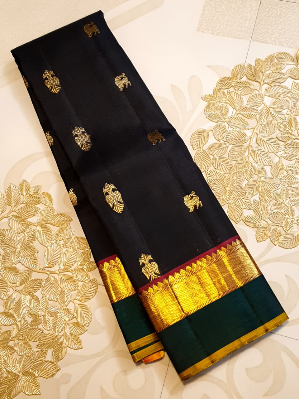Darkest Purple Kanchipuram Handloom 2G Gold Pattu Silk Saree with Bottle Green and Red borders.