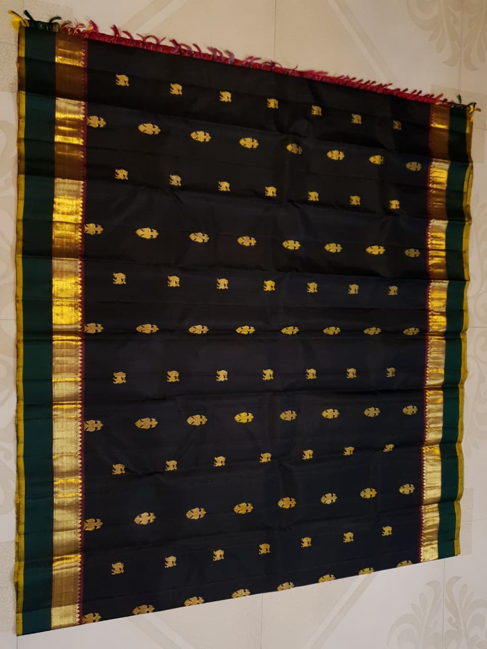 Darkest Purple Kanchipuram Handloom 2G Gold Pattu Silk Saree with Bottle Green and Red borders.