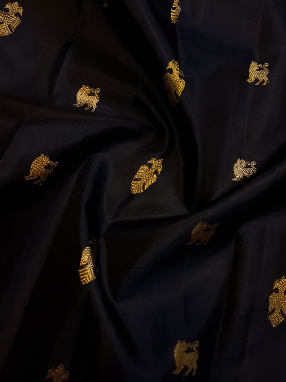 Darkest Purple Kanchipuram Handloom 2G Gold Pattu Silk Saree with Bottle Green and Red borders.