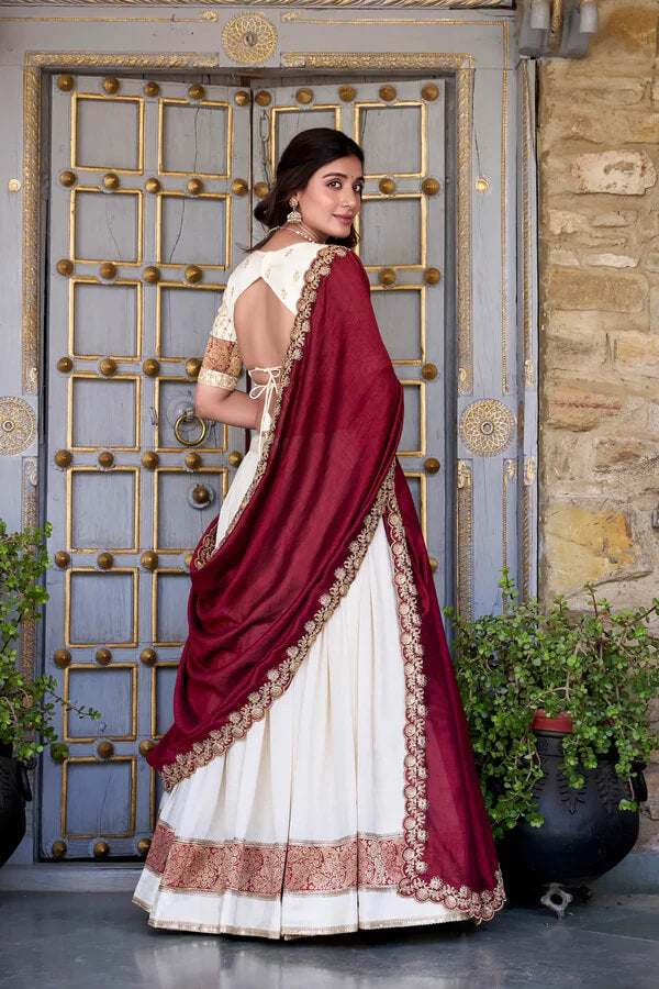 Off White Silk Lehenga with Zari Weaving and Sequins Accent