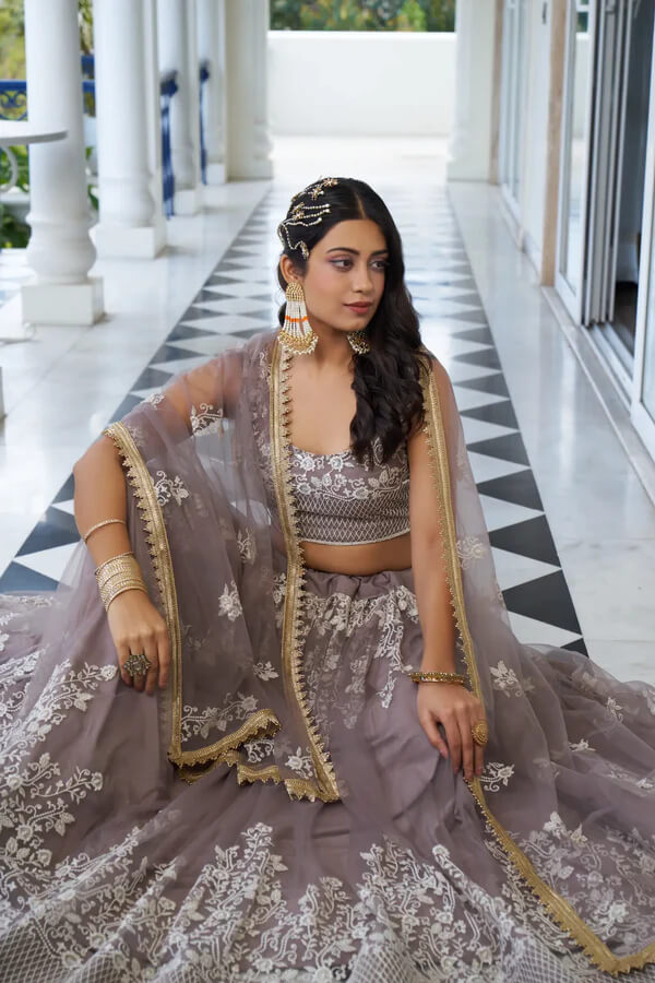 Designer Dusty Rose Net Lehenga Choli with Sequins Detailing
