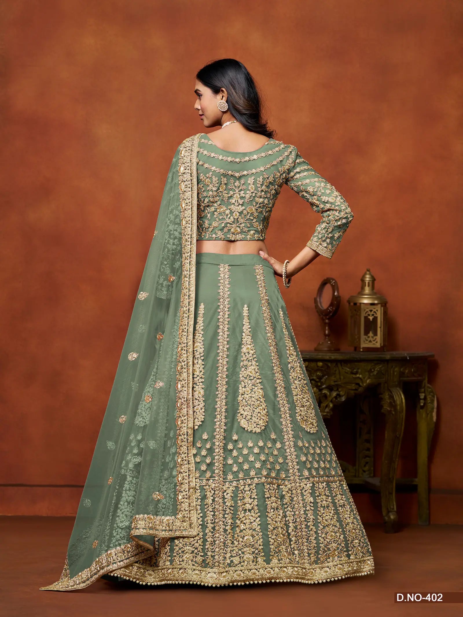 Pastel Green Sequence Embroidered Net Lehenga Choli