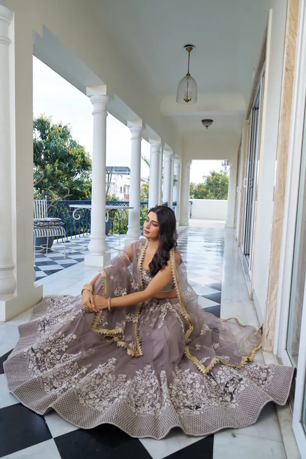 Designer Dusty Rose Net Lehenga Choli with Sequins Detailing