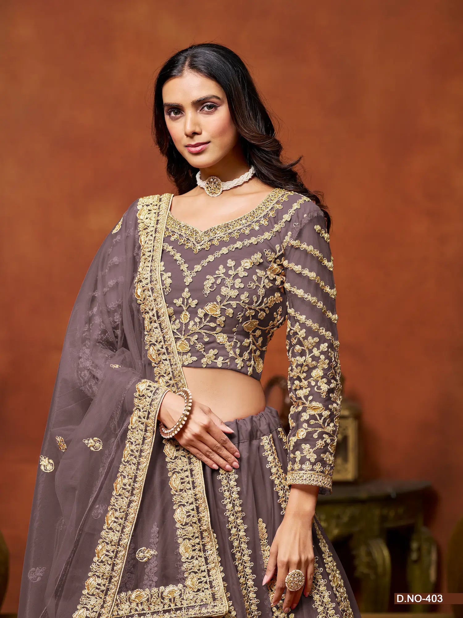 Dusty Gray Sequence Embroidered Net Lehenga Choli