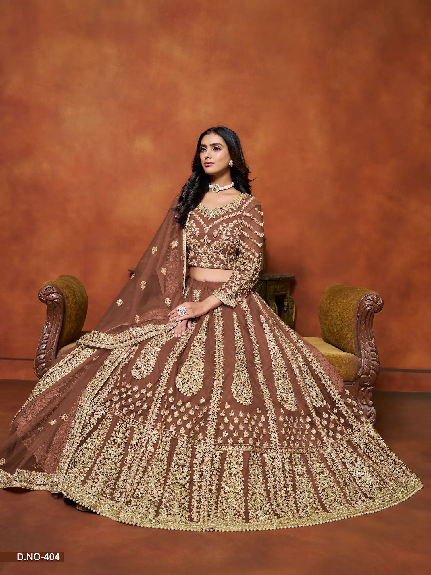 Rust Brown Sequence Embroidered Net Lehenga Choli
