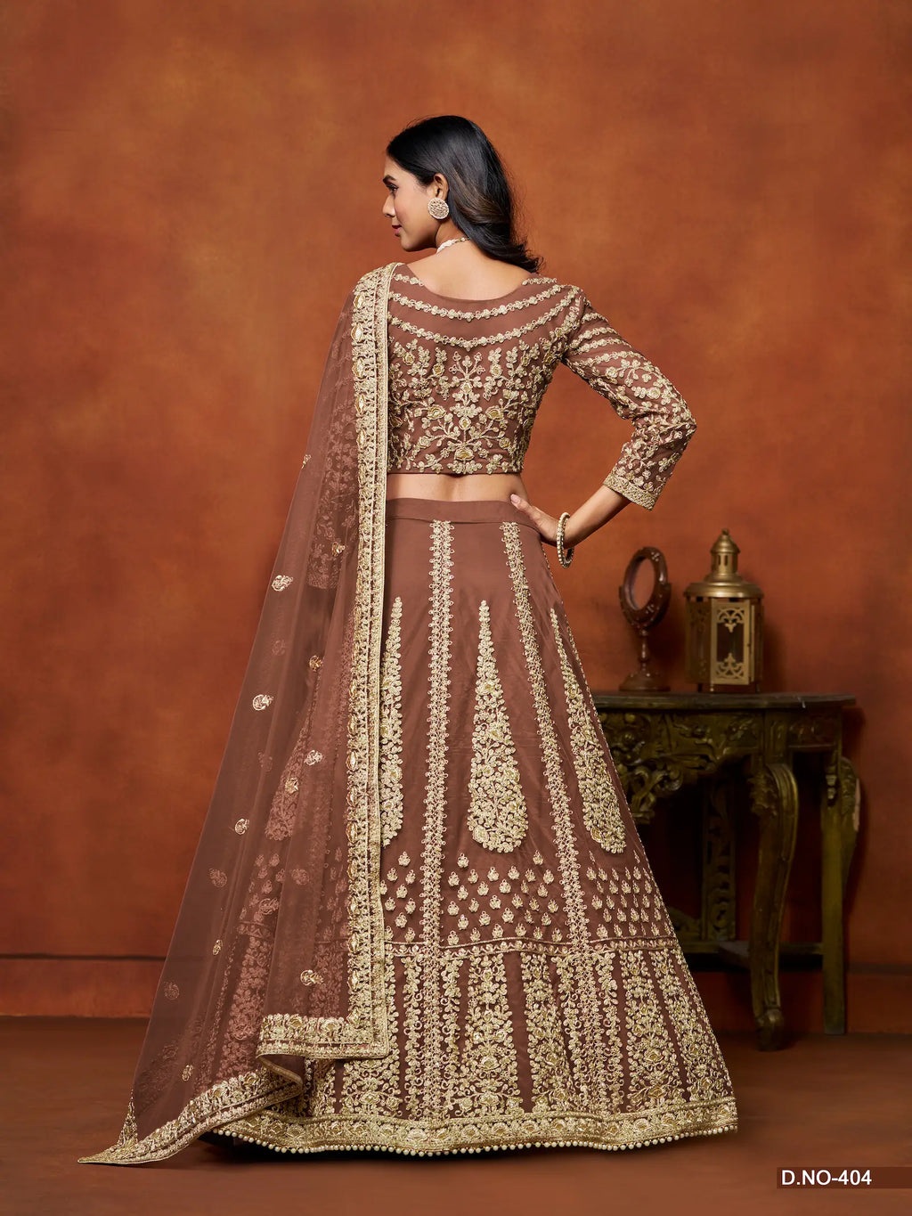 Rust Brown Sequence Embroidered Net Lehenga Choli