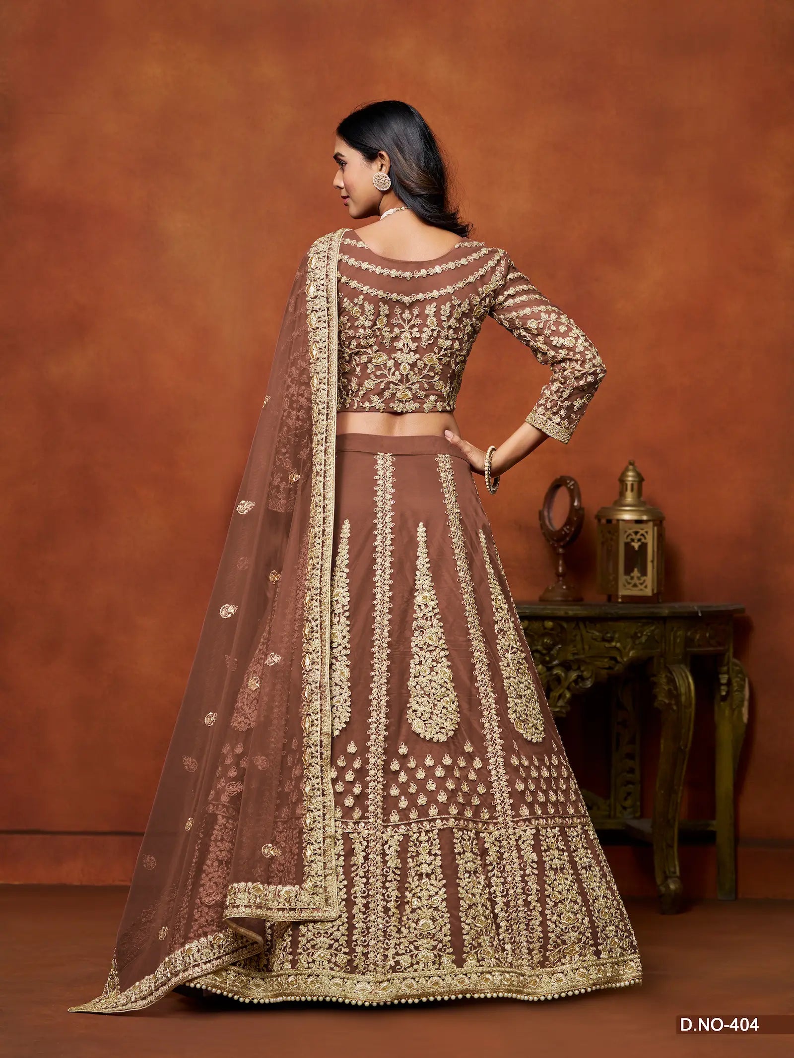Rust Brown Sequence Embroidered Net Lehenga Choli