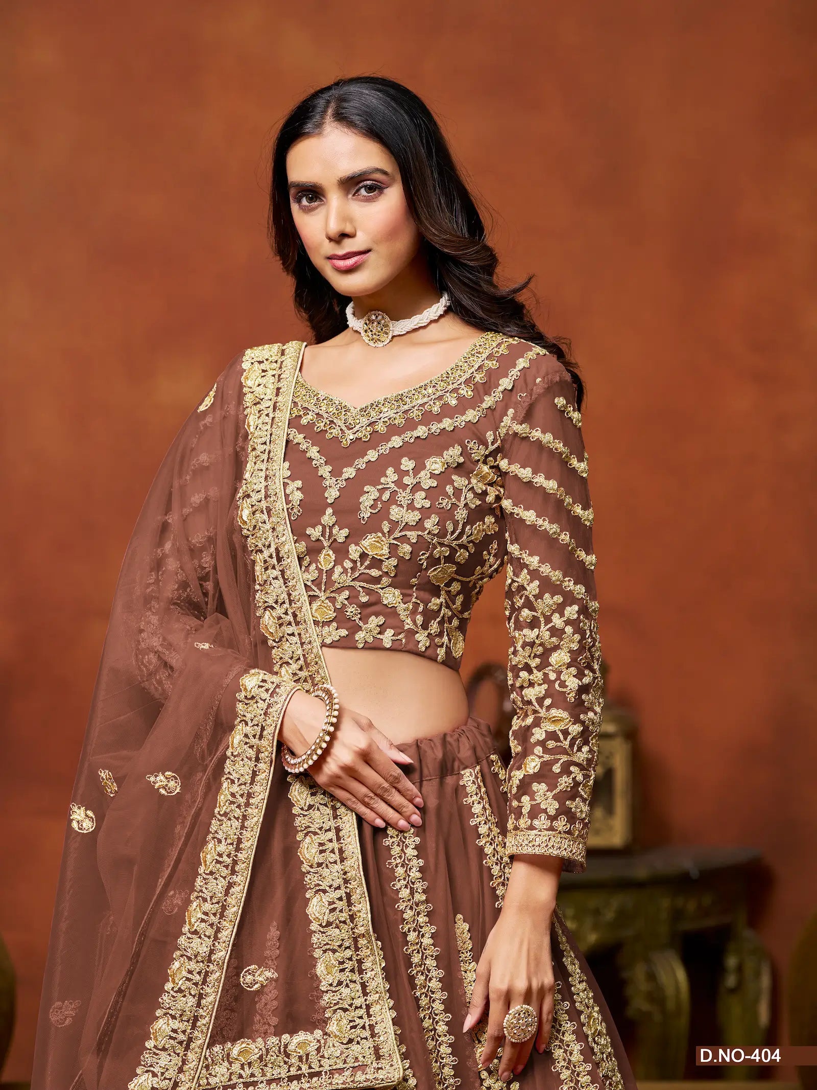 Rust Brown Sequence Embroidered Net Lehenga Choli